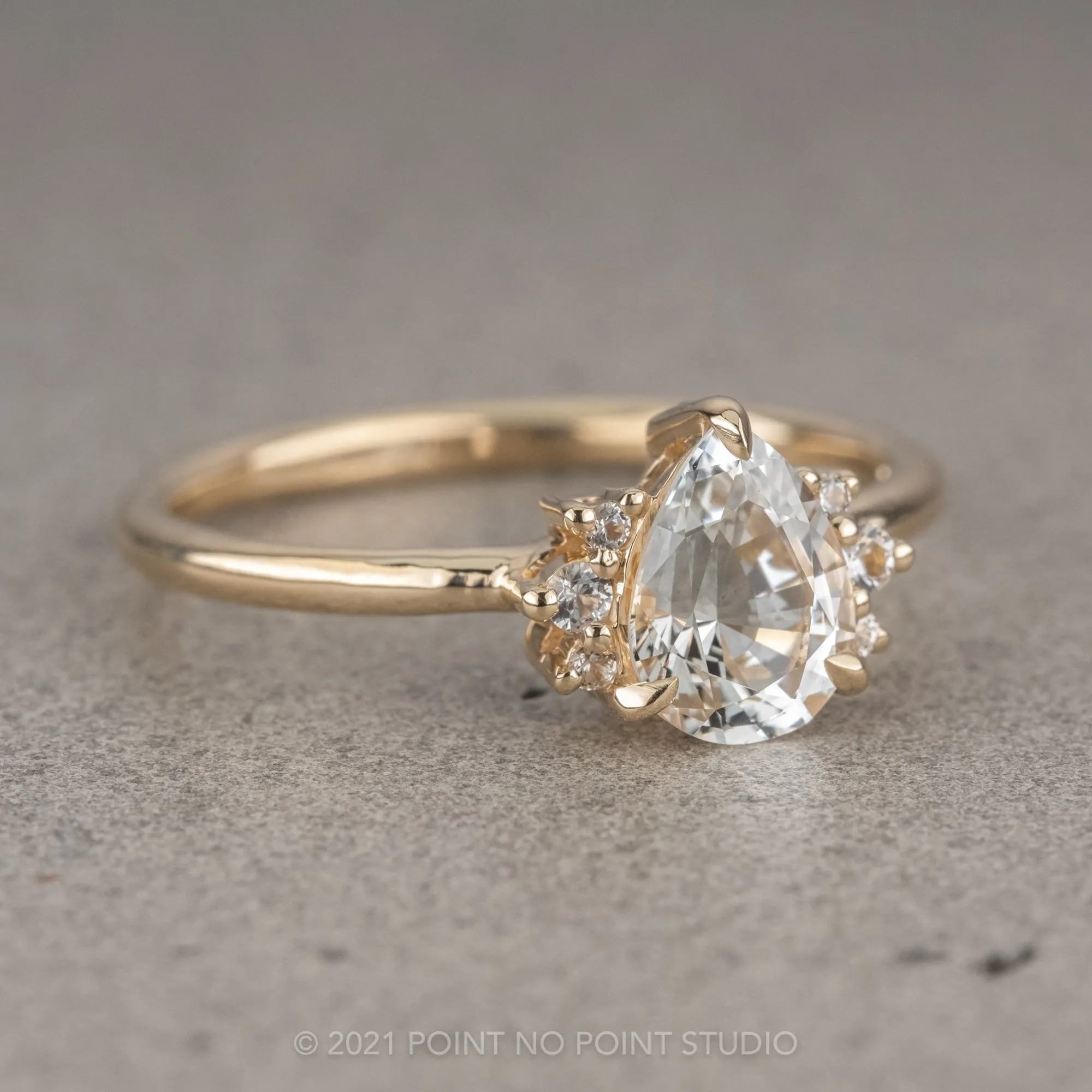 1.04 Carat White Pear Sapphire Engagement Ring, Charlotte Setting, 14k Yellow Gold