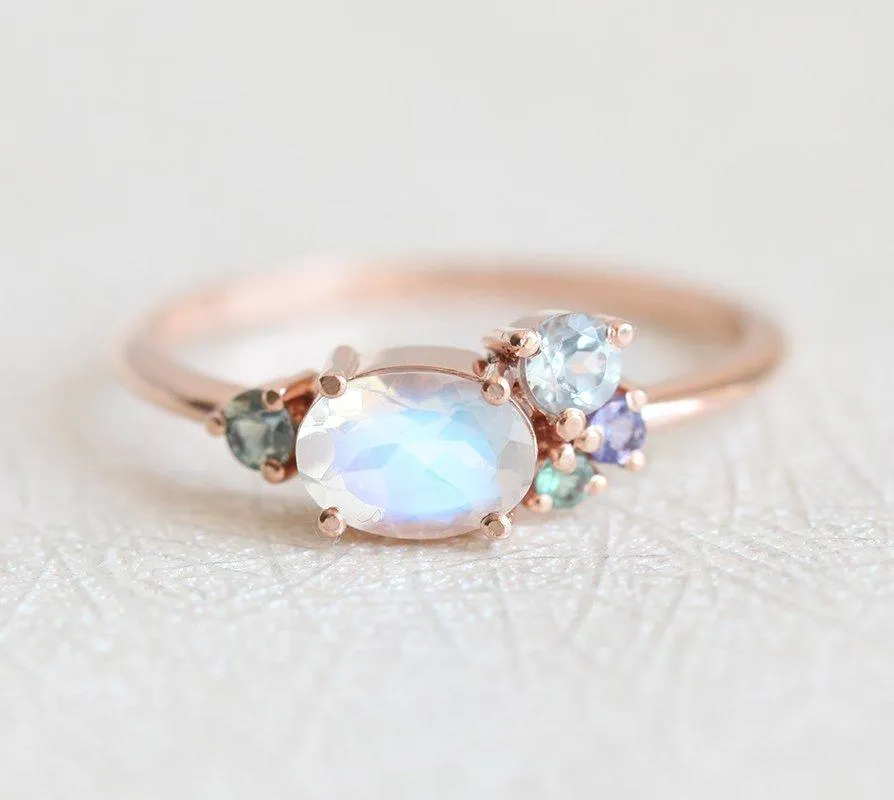 Merritt Oval Moonstone Tanzanite Sapphires Cluster Ring